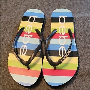 Bebe pave’ striped colorful flip flops NWOT
